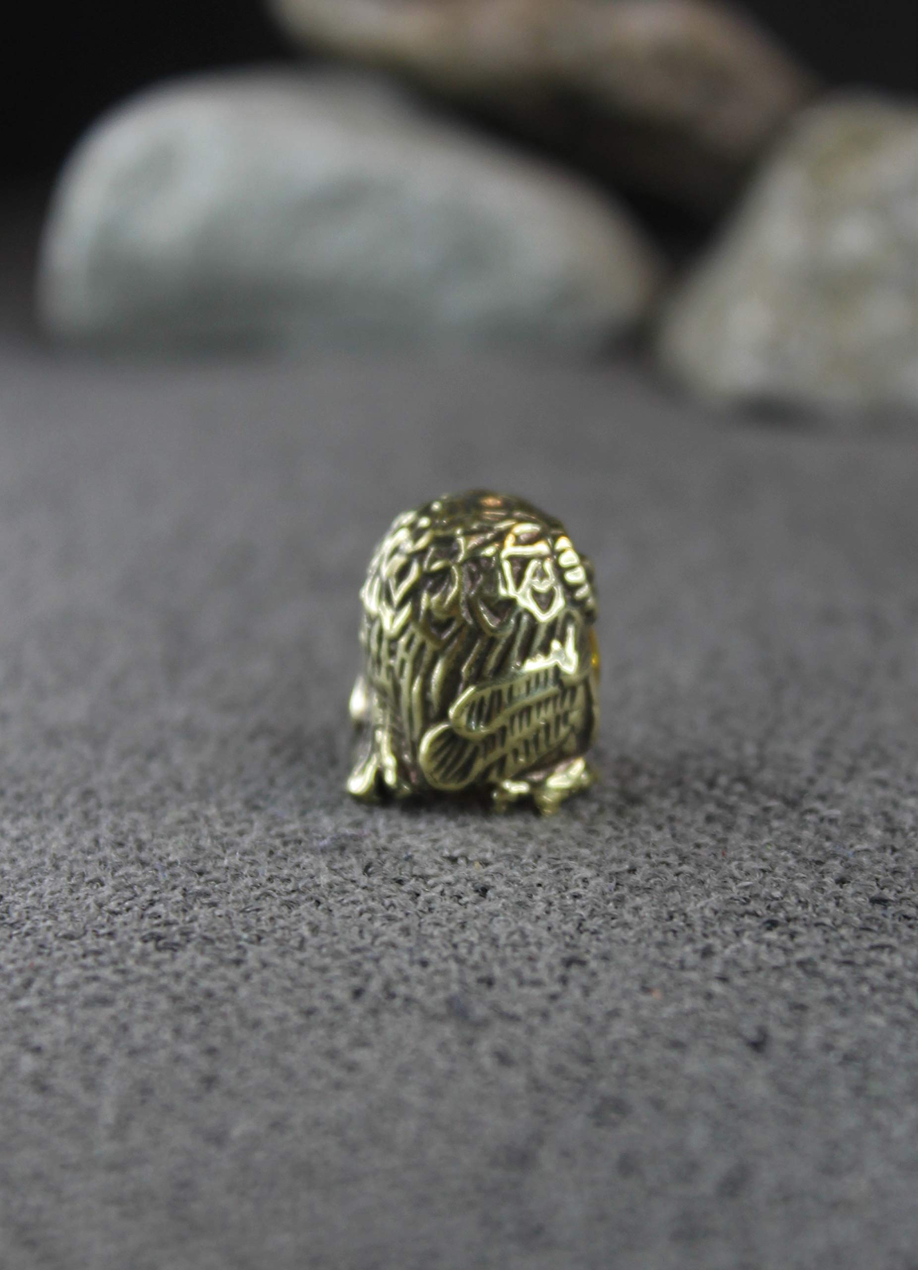 Epoxy bead accent on brass owl ornament