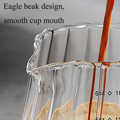 Ribbed glass espresso cup with wooden handle