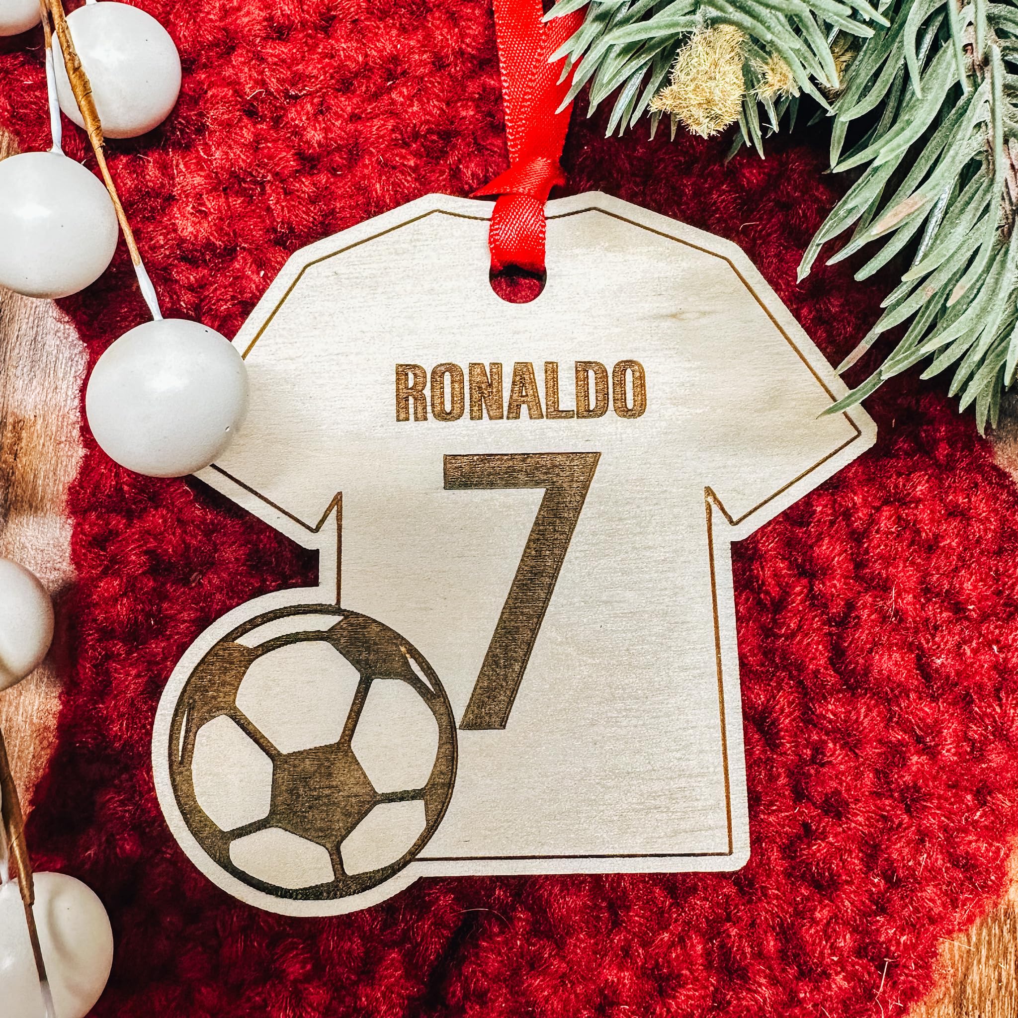 Red ribbon included Ronaldo Ornament for hanging by Etch Society