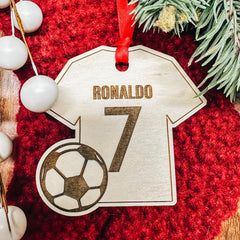 Red ribbon included Ronaldo Ornament for hanging by Etch Society