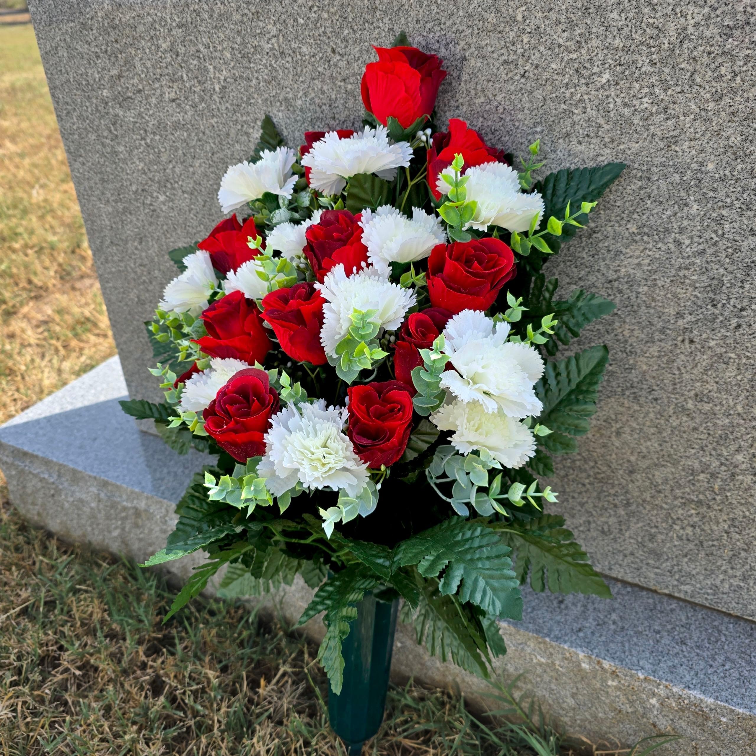 Silk fern greenery on back of cemetery cone