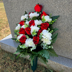 Silk fern greenery on back of cemetery cone