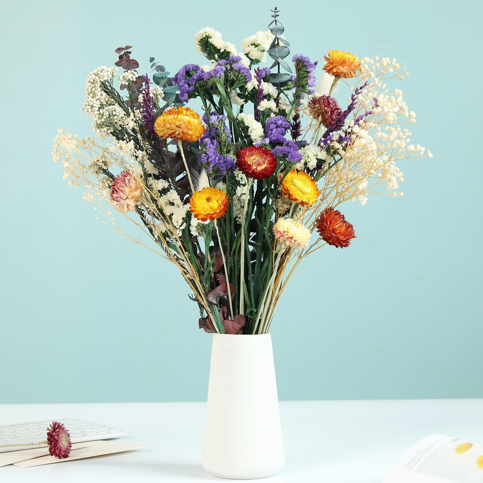 Natural dried flower bouquet packaging and display options