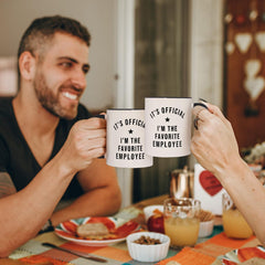 Favorite employee mug on desk showing status