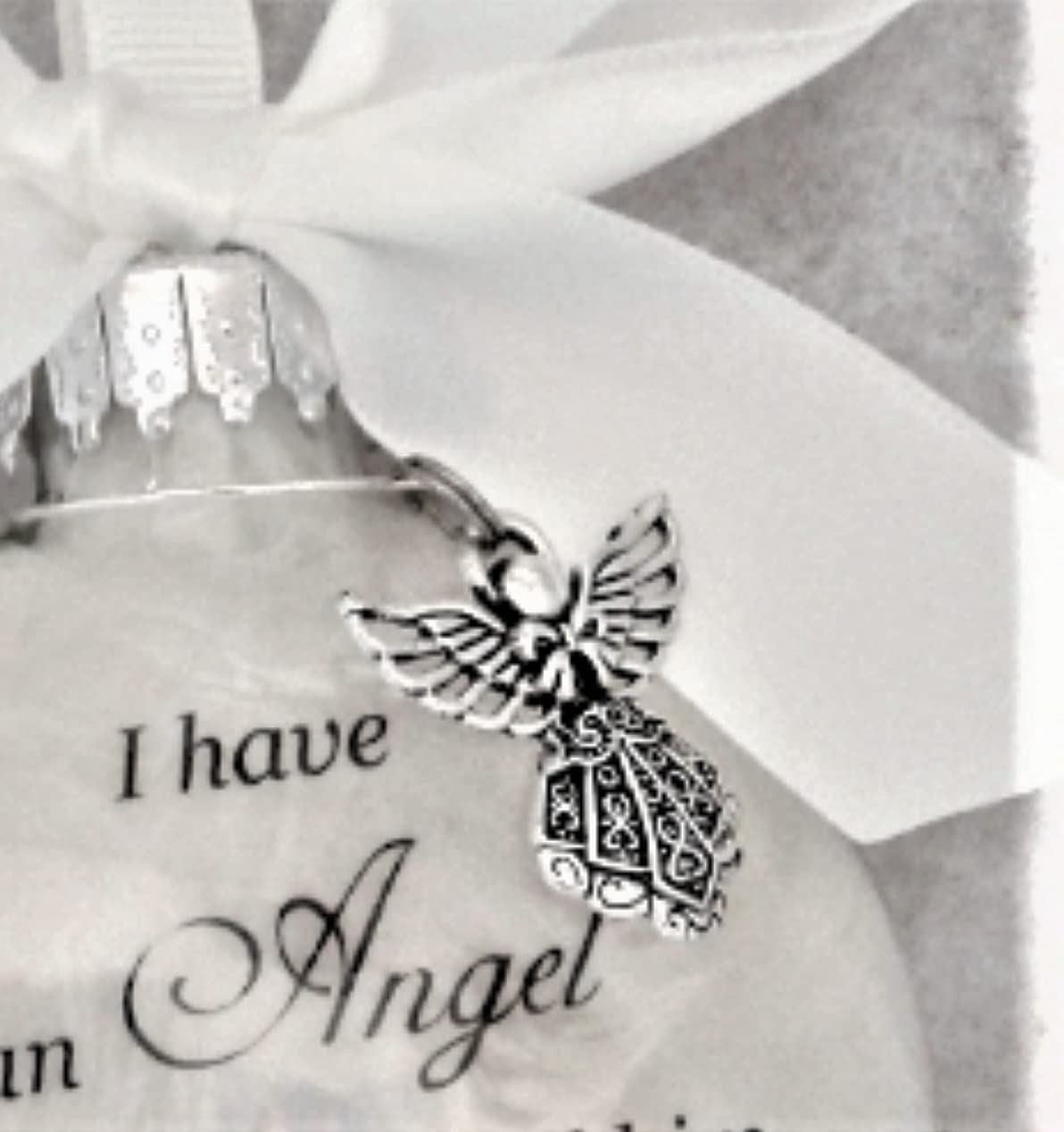 Feather filled glass ornament handmade in USA
