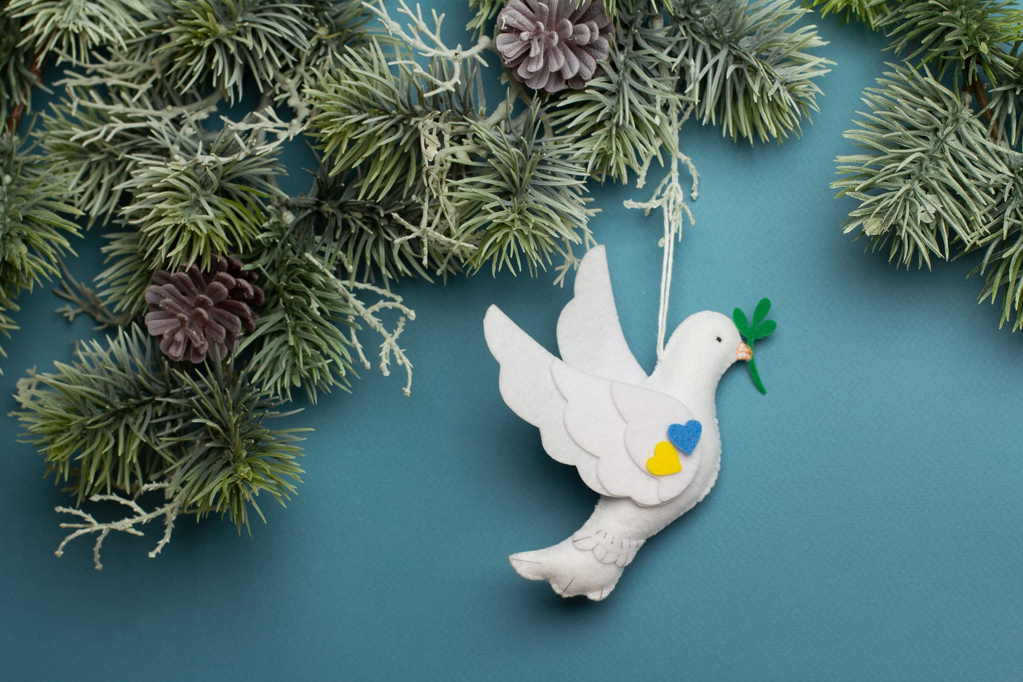 Handmade felt dove ornament hand cut and sewn
