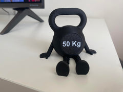 Home office decor kettlebell sculpture on shelf