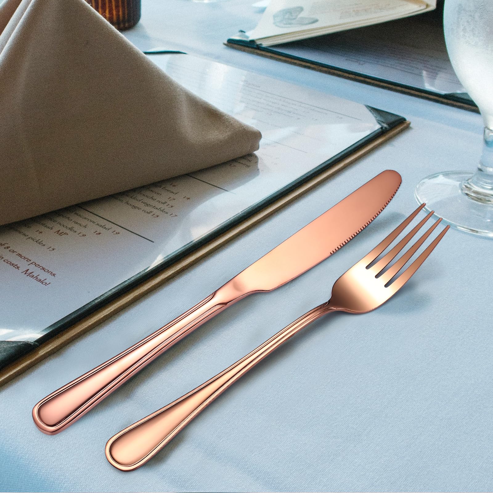 flatware set for 4 people rose-gold on table image
