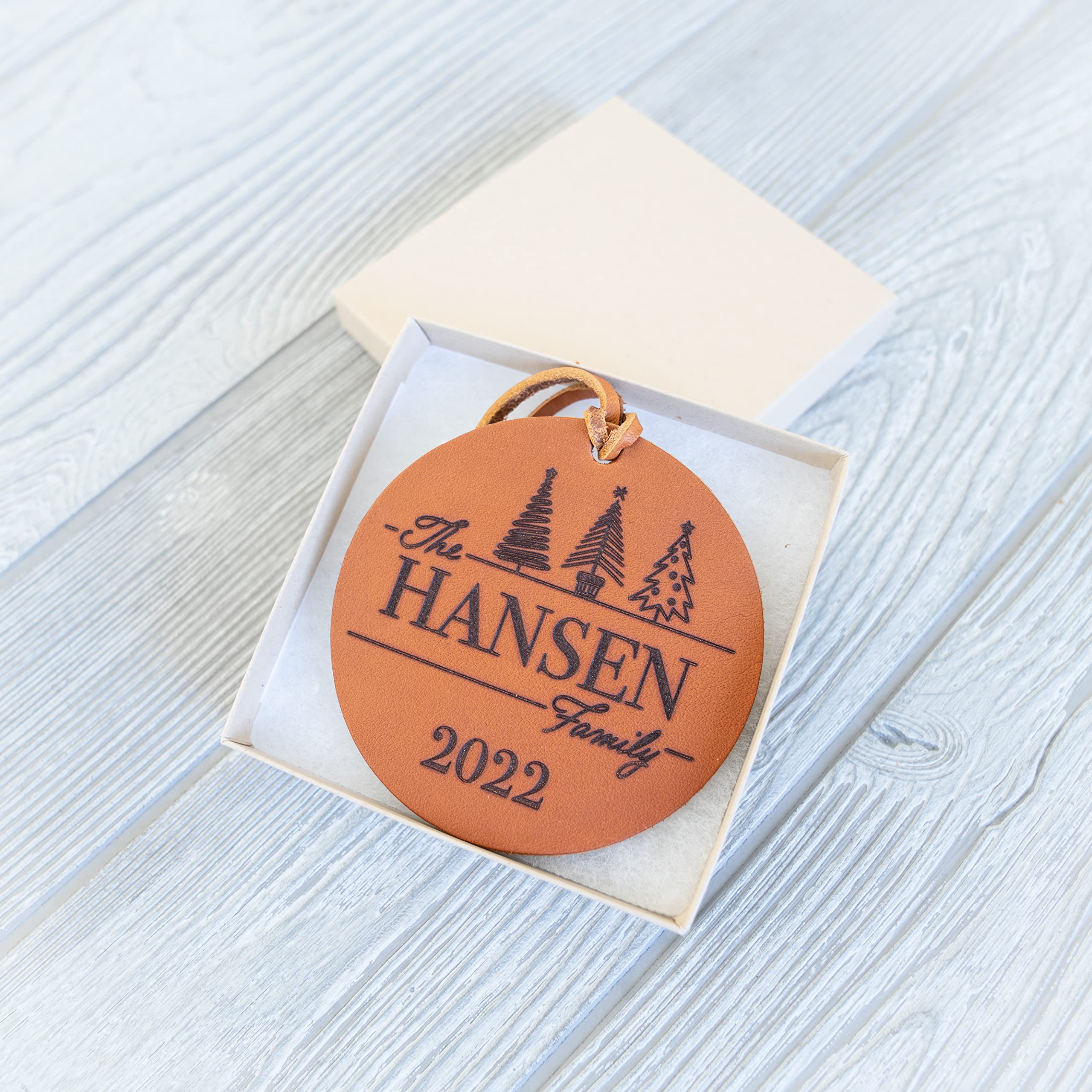 Circle 3.5 inch leather ornament alt text