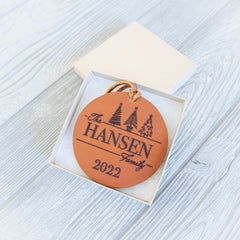 Circle 3.5 inch leather ornament alt text