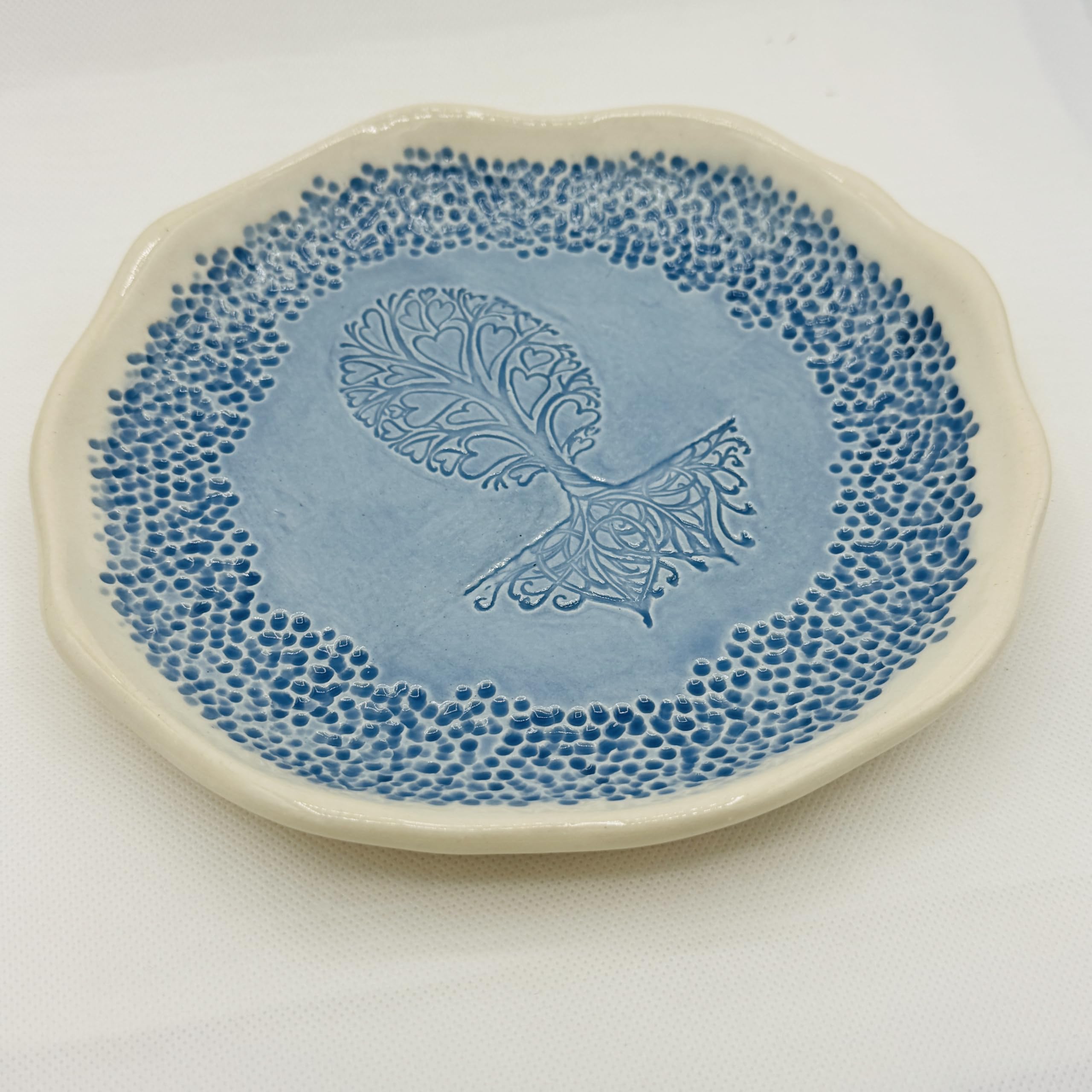 8 inch handmade pottery bowl with tree of hearts design