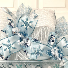 Premium ribbons and accents on Fresh Flurries 24 inch wreath