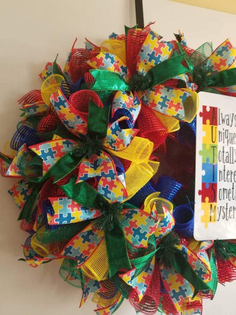 Deco mesh wreath with sign for front door display
