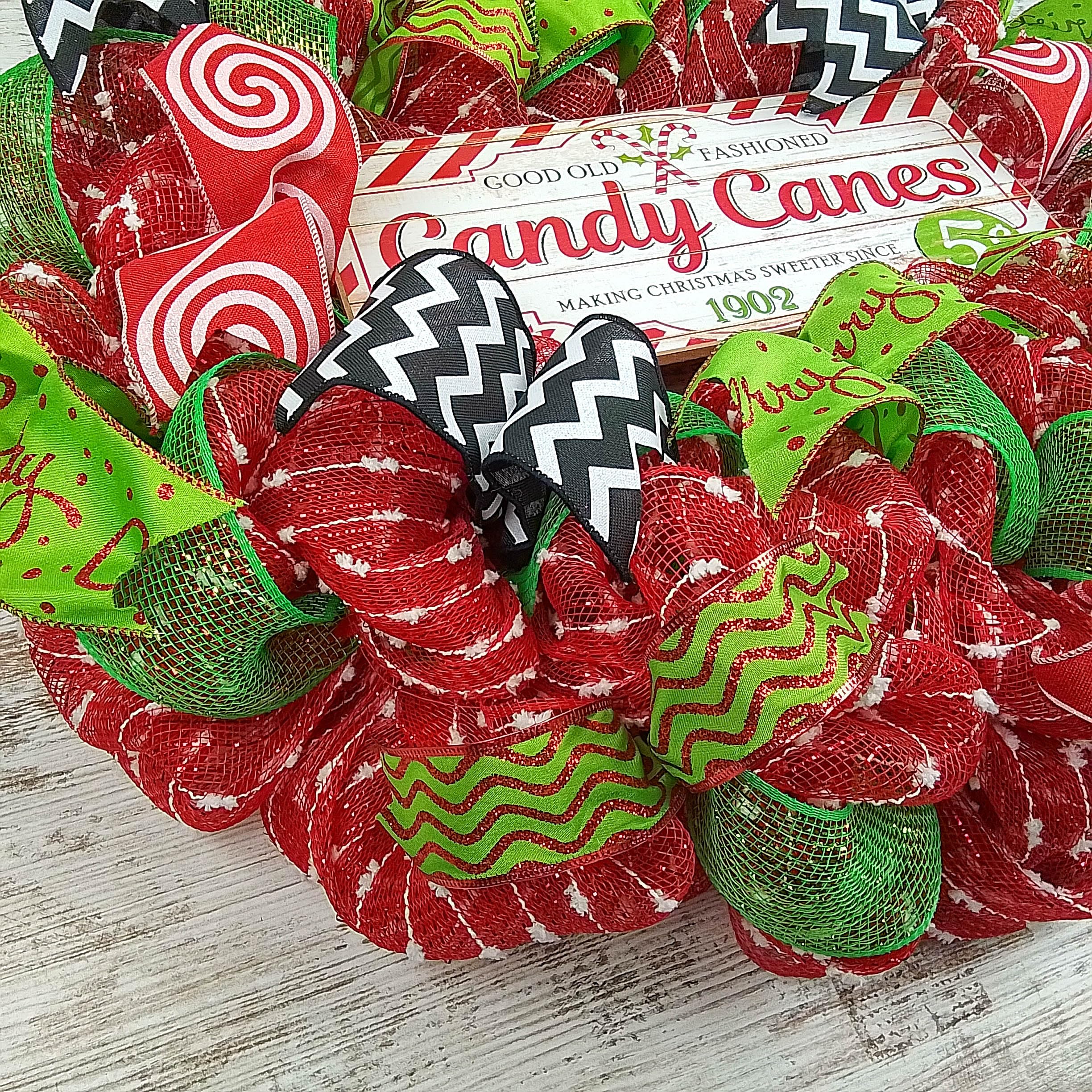 Lime green and black mesh accents on holiday wreath