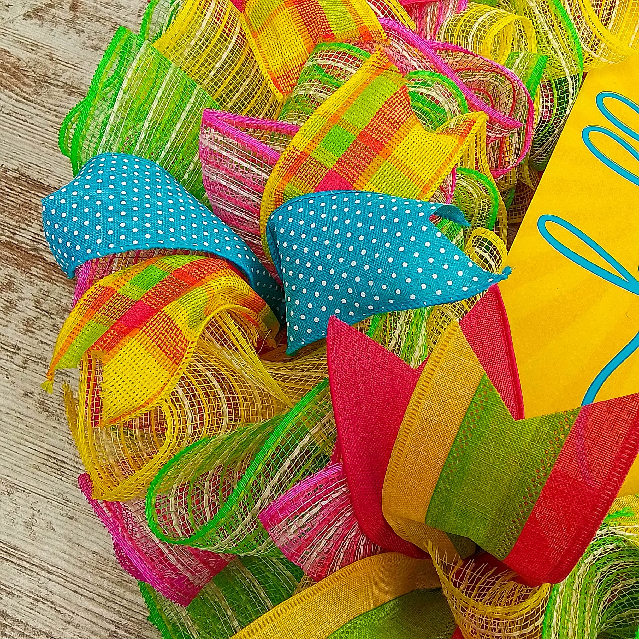 Removable Hello Sunshine centerpiece at wreath center