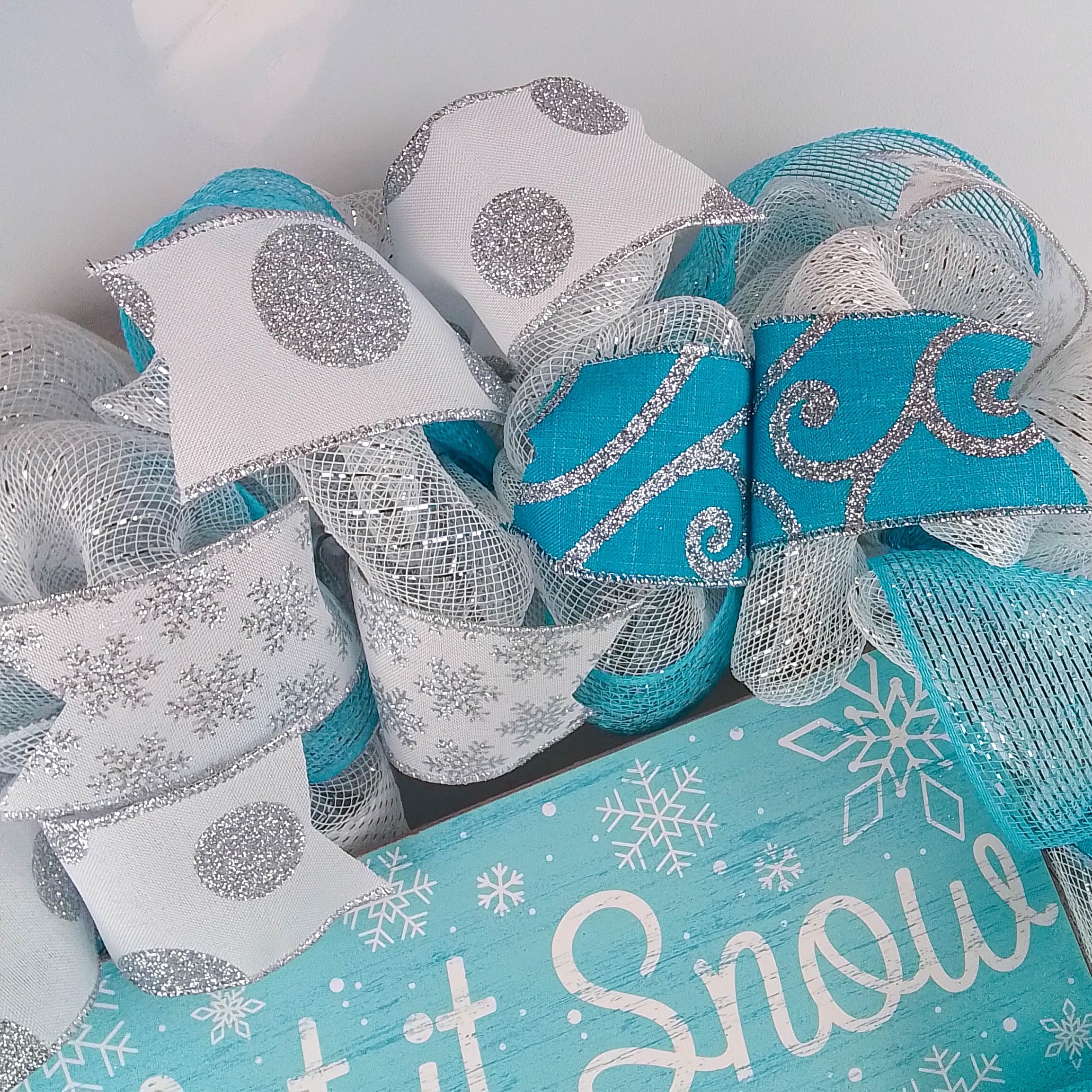 Indoor and outdoor wreath sheltered from elements
