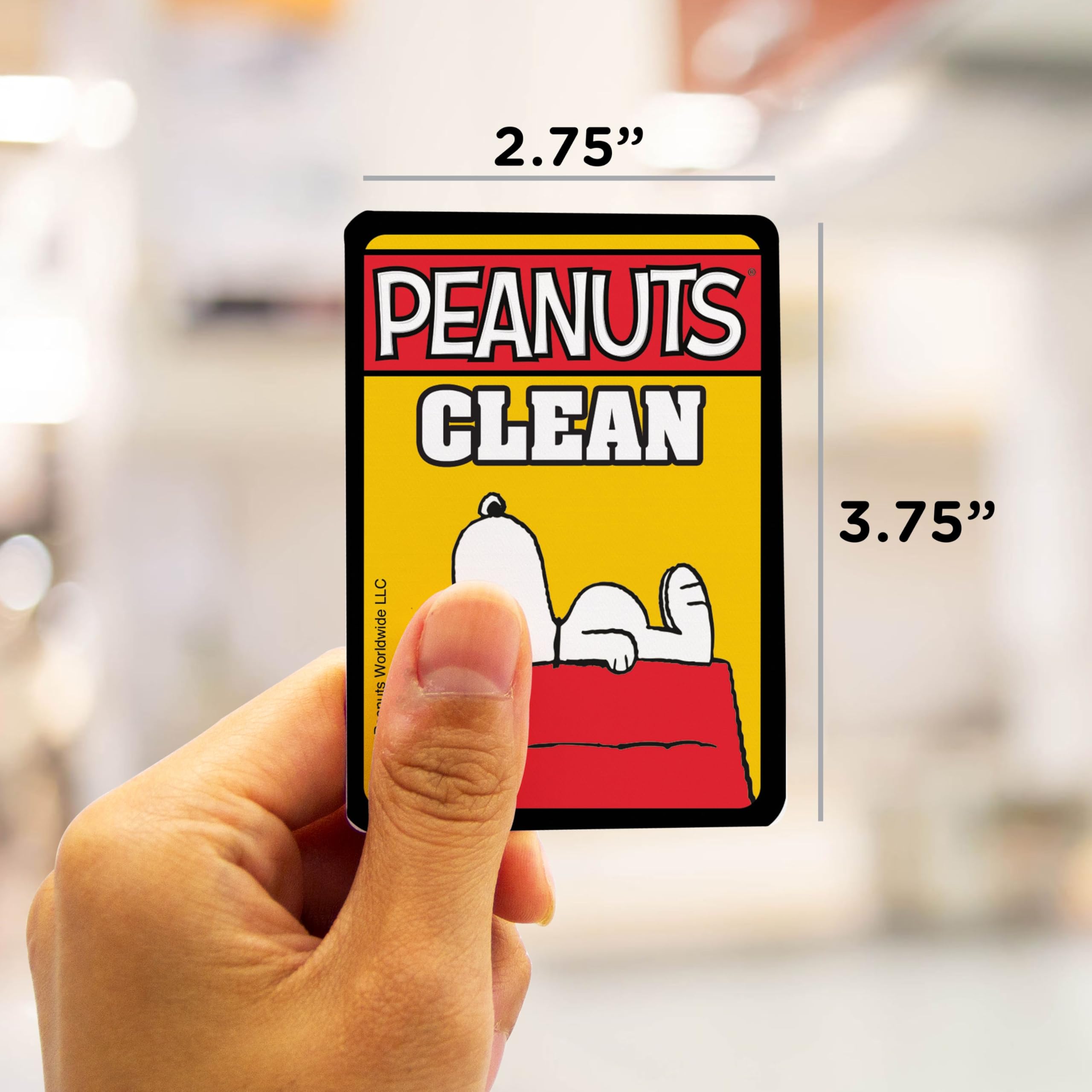 Peanuts merchandise magnet Aquarius on metal surface