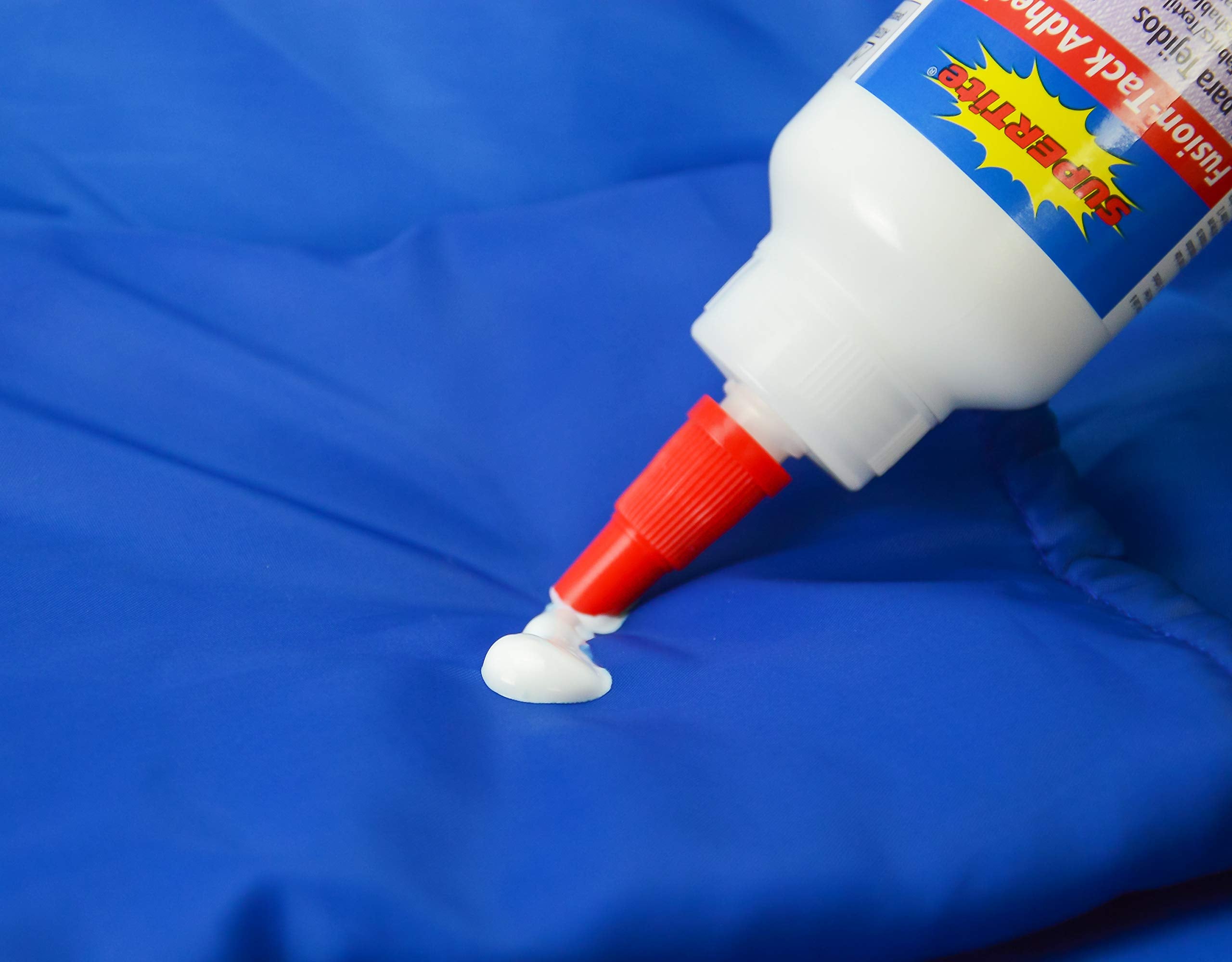 Fusion Tack Adhesive 100ml packaging for textiles image