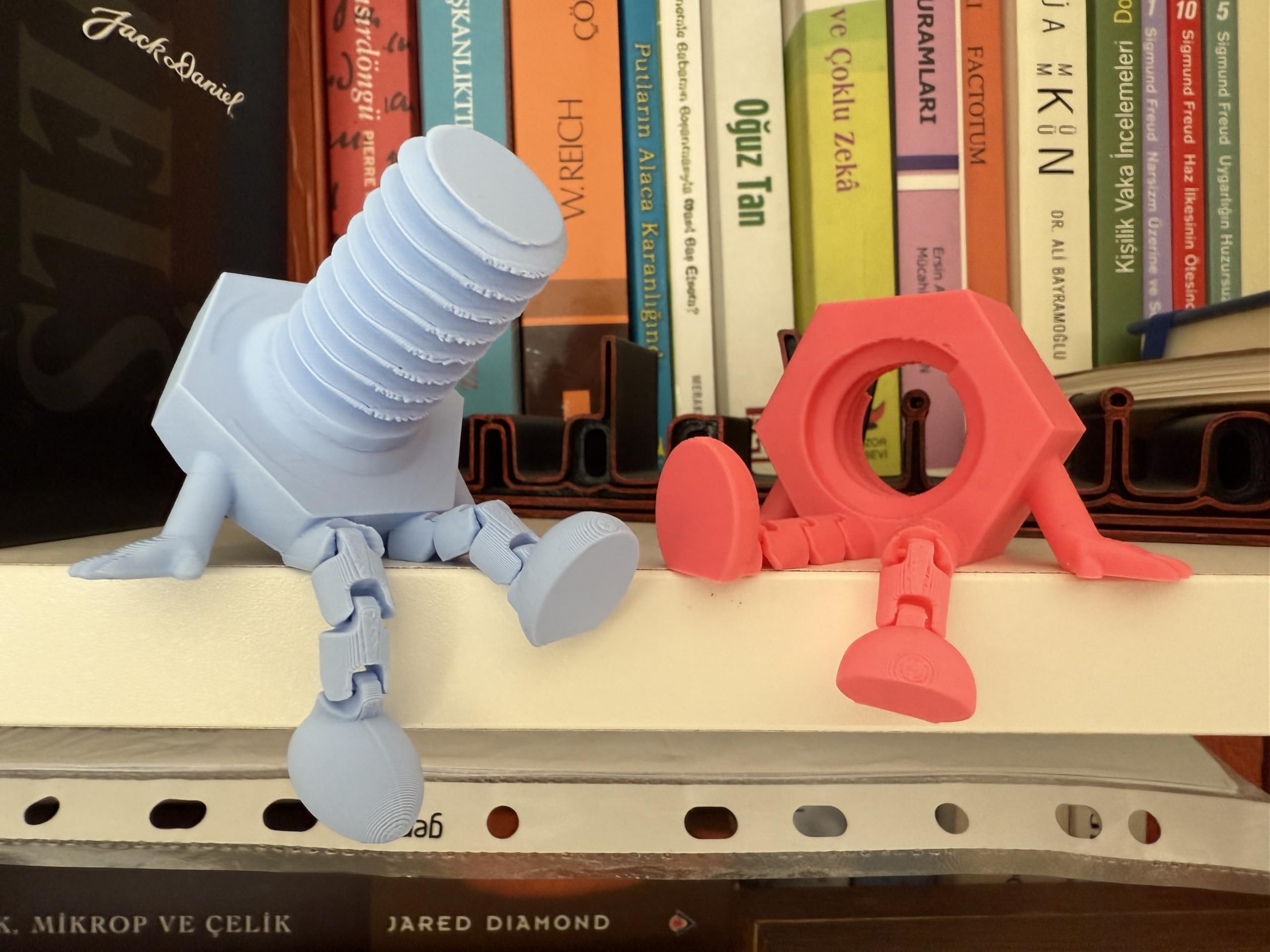 Bolt and Nut figurine dimensions Bolt 2.7 x 2.7 x 2.2 in Nut 2.7 x 2.4 x 2 in