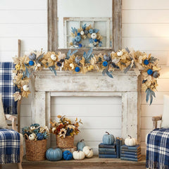Blue fall garland with lights displayed on fireplace by GAGEC