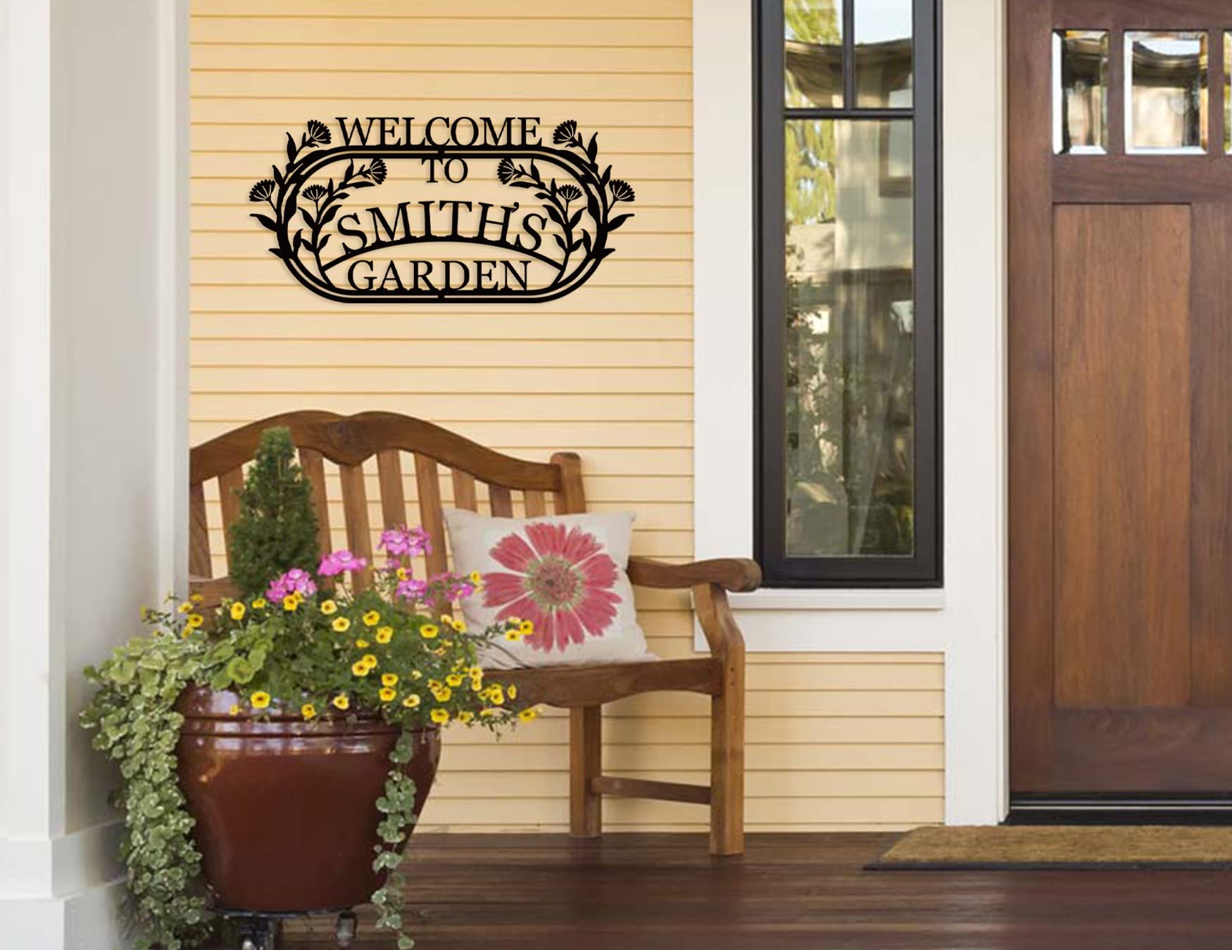 Gardener presents sign for outdoor space