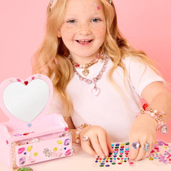 Gem stickers included for decorating the mini vanity