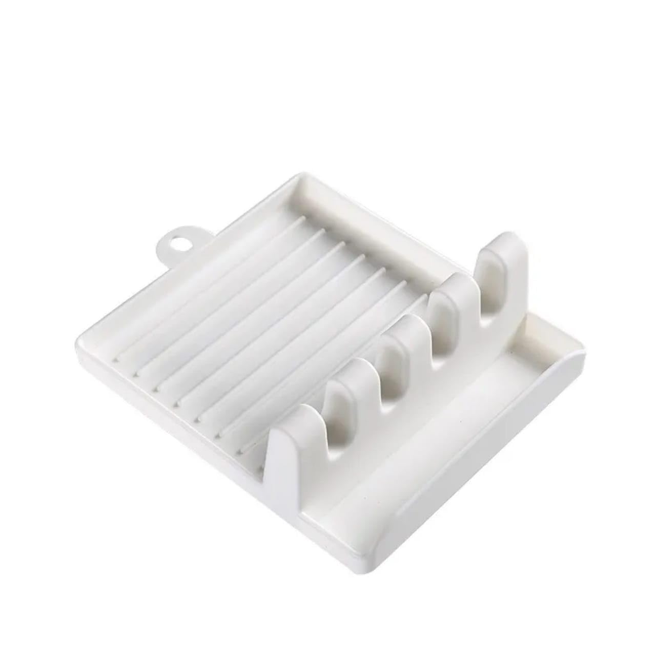 Generic Spoon Rest-12 white plastic utensil rest on kitchen counter