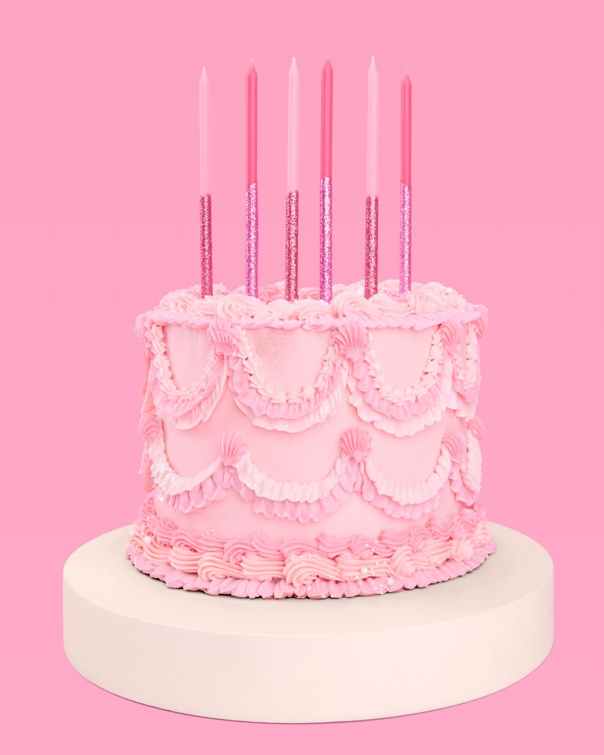 candle bases included with pink glitter cake candles