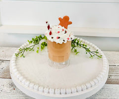 handcrafted clay gingerbread cookie with sprinkles close up