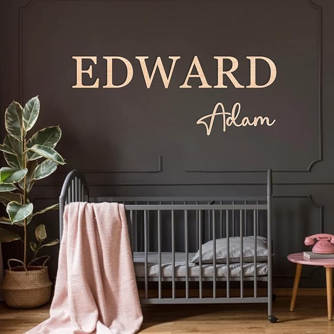 Girl room decor featuring nursery name sign and wooden letters