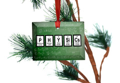 Glass ornament with periodic table design and red hanging ribbon