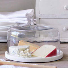 Glass cloche with white marble base serving board detail