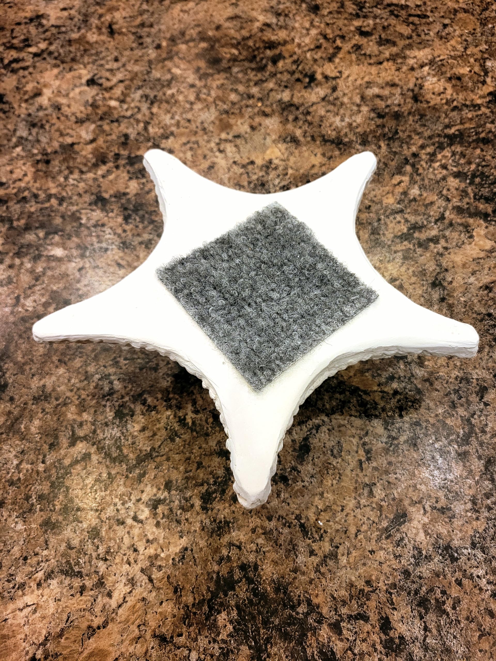 Soft carpeted bottom protects surfaces