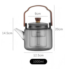Glass teapot on stovetop showing heat resistant borosilicate glass