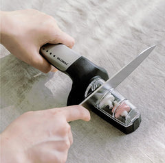 Global 2-Stage Handheld Knife Sharpener stainless steel close up coarse stage
