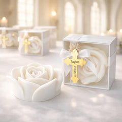 Candle in clear gift box with dried flowers and ribbon