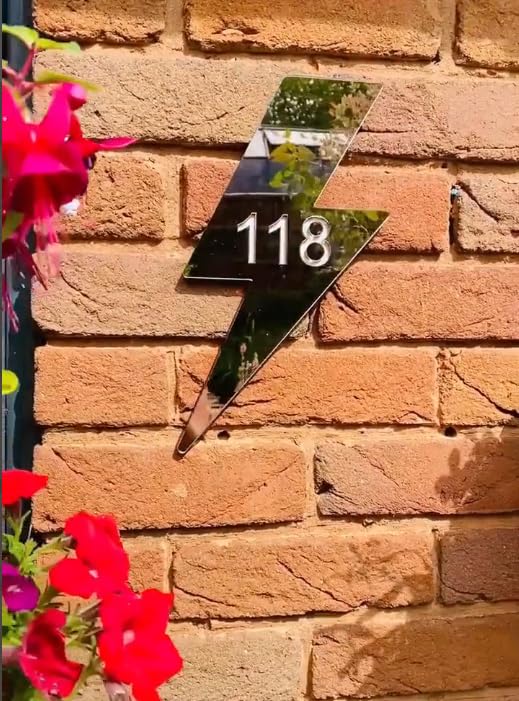 Wall mounted gold bolt decor exterior