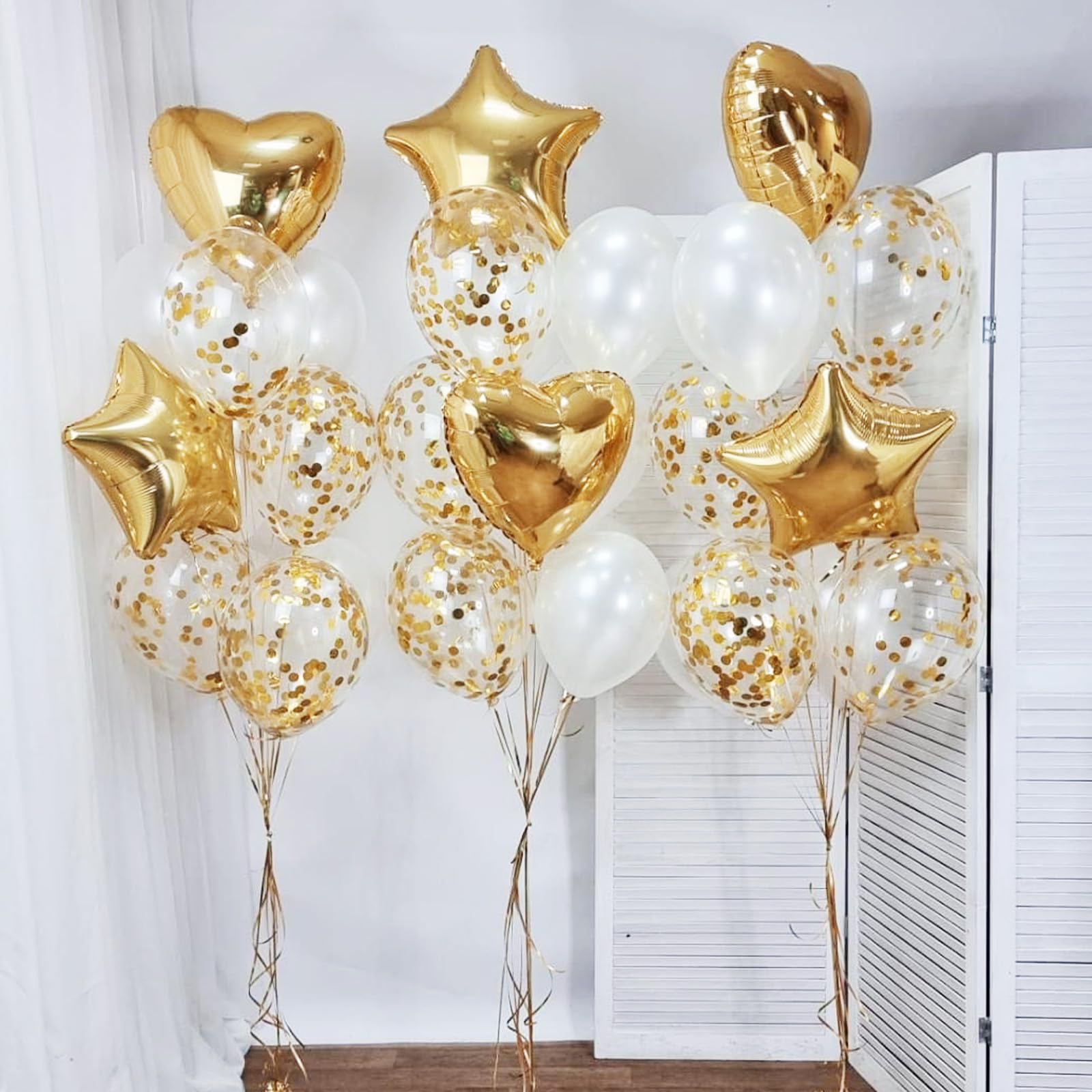 Graduation party with gold confetti balloons decor