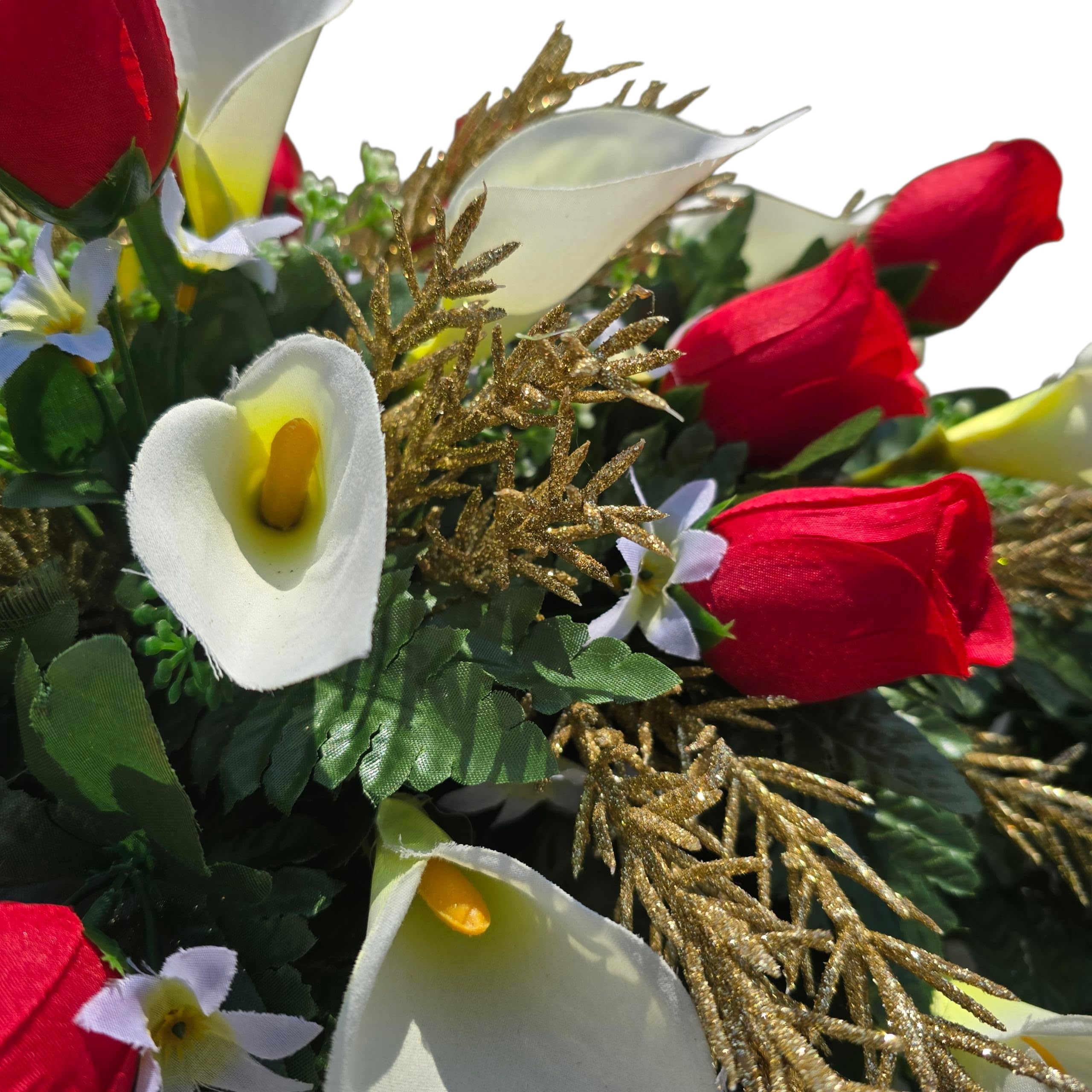 Close up of red rosebuds on cemetery saddle