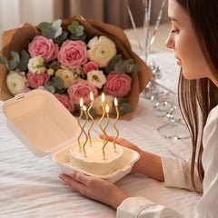 Gold spiral birthday candles for cake decoration