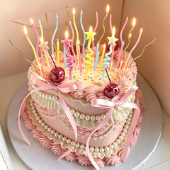 Gold twisty birthday candles included in the pack