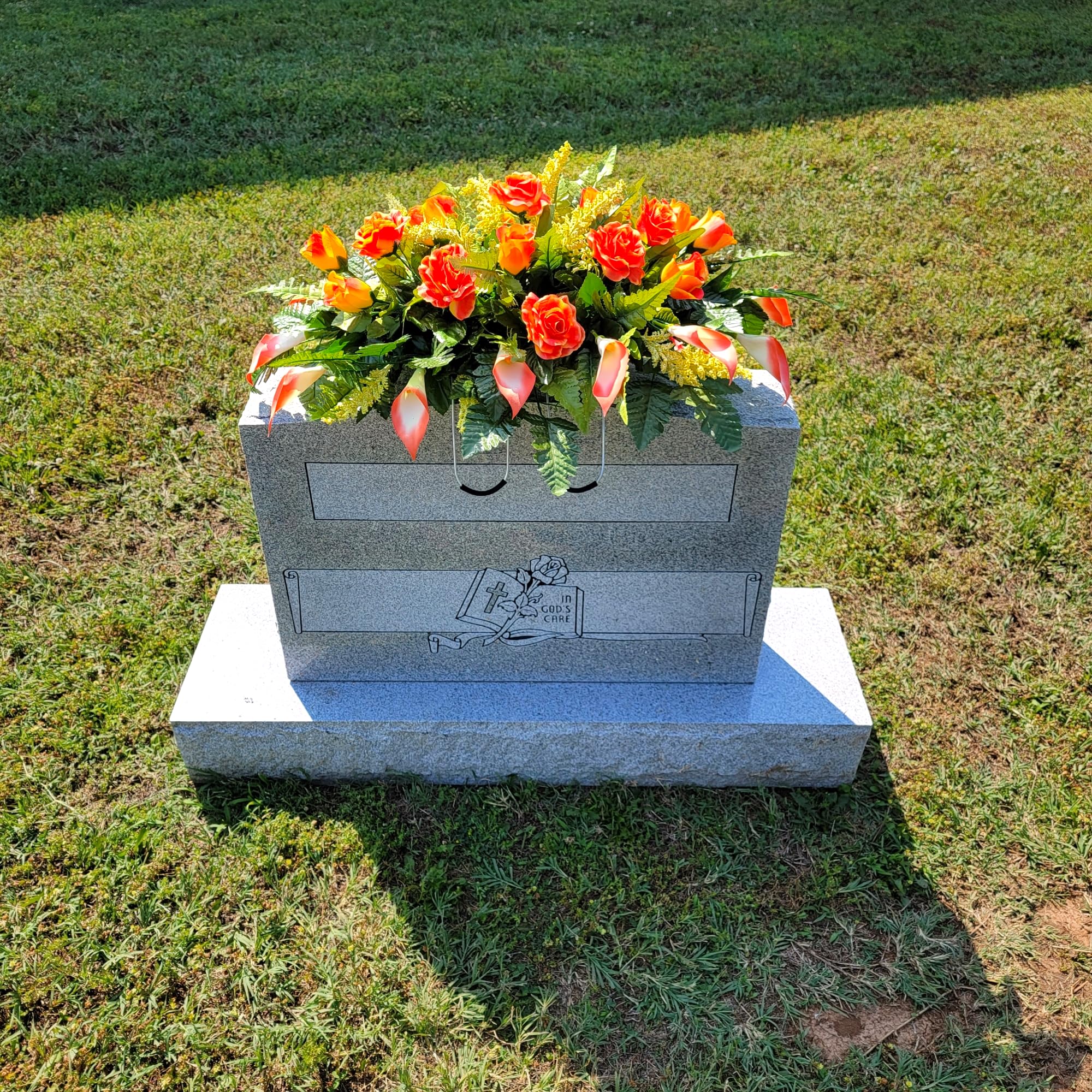 Decorative grave saddle ready for headstone display