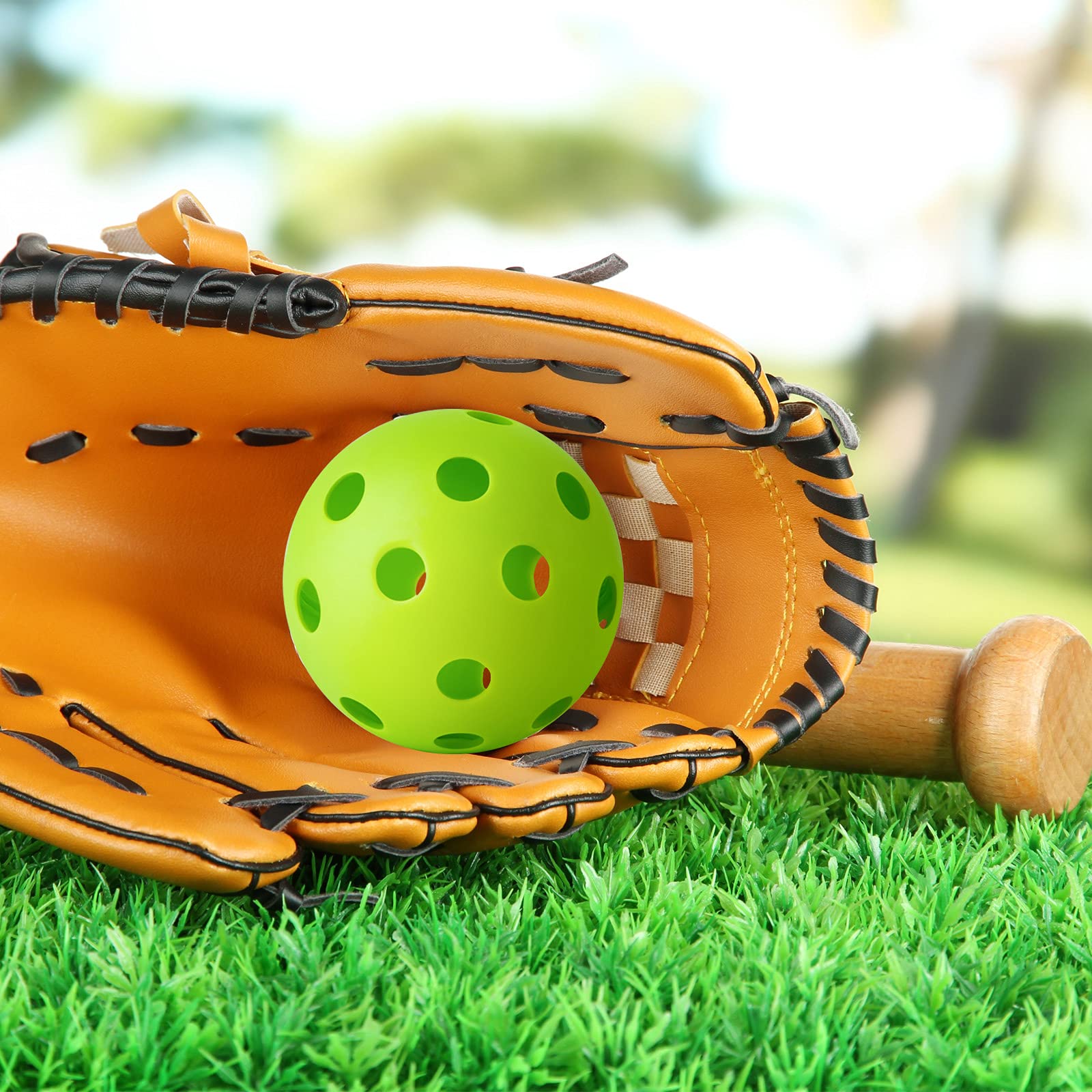 Green Coopay practice balls for hitting and catching