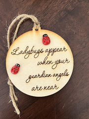 Twine hanging string on round wooden keepsake