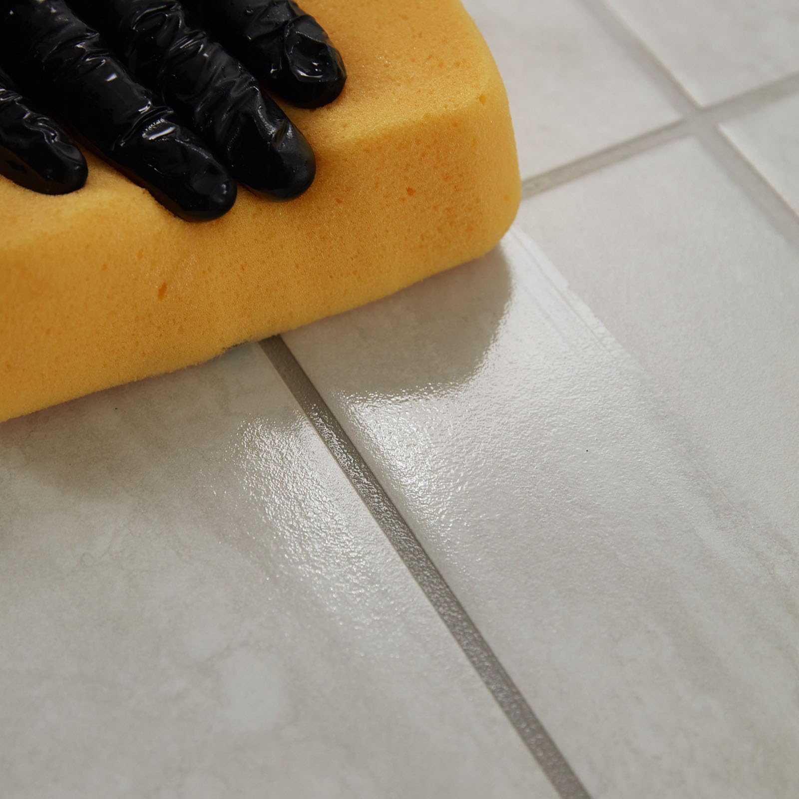 Grout colorant and sealer suitable for sanded and unsanded grout