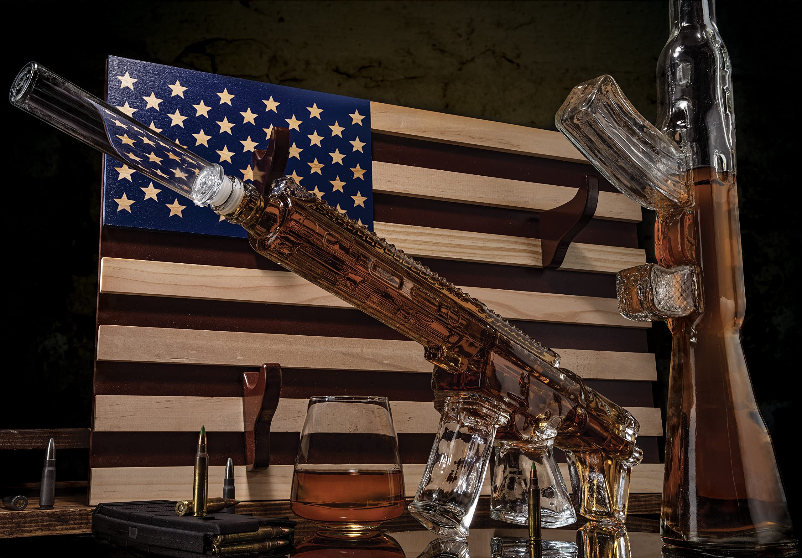 Two gun shaped whiskey decanters