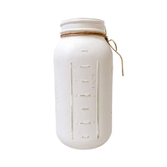 White painted mason jar with rustic distressed finish