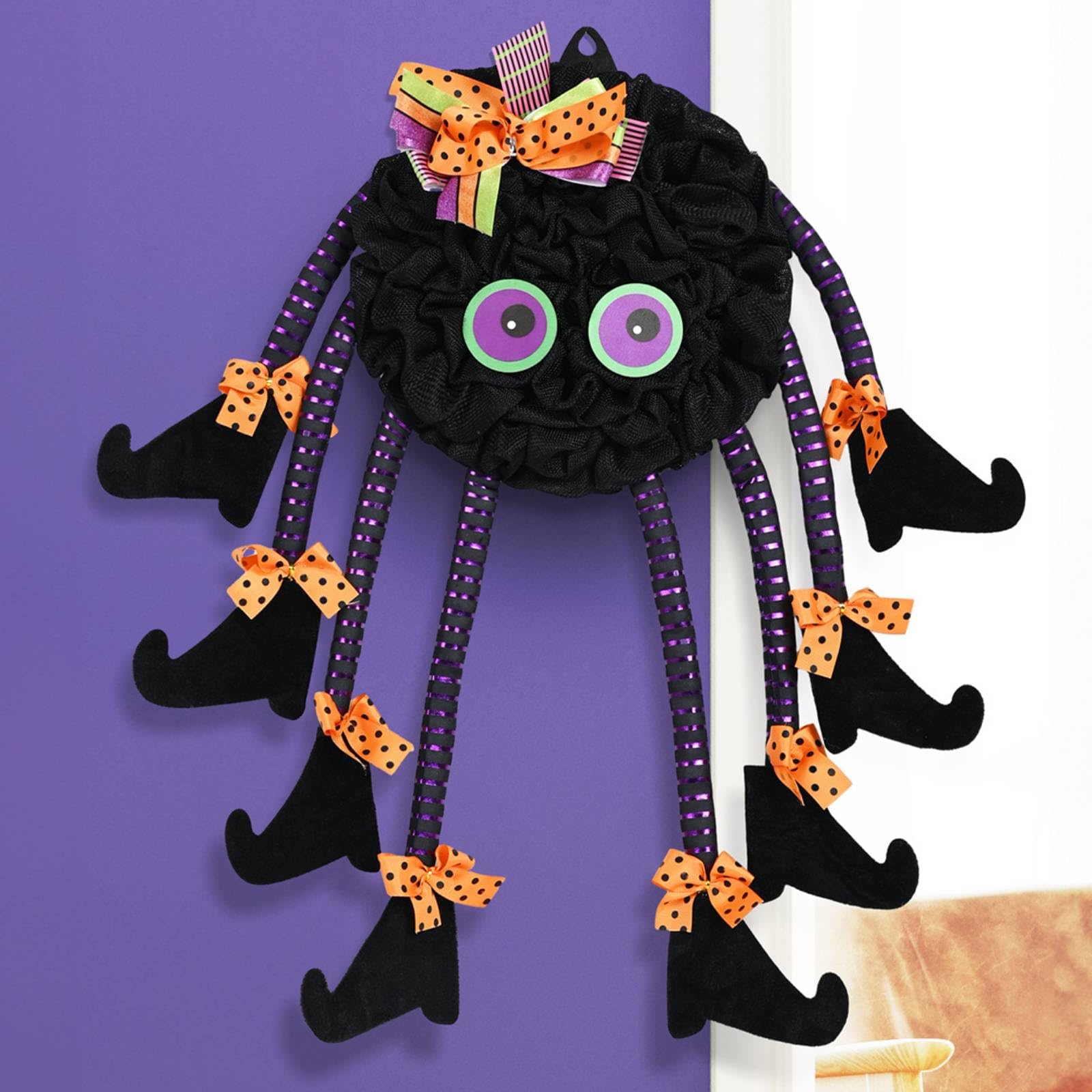 Wreath features spider design for Halloween decor