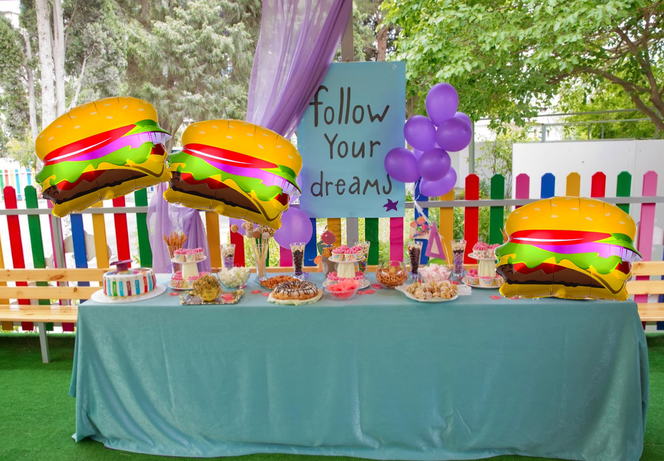 Fast food themed party decor with hamburger balloons