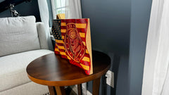 Burned and hand-painted detailing on oak flag